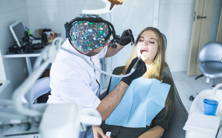 dentist-curing-female-patient-s-teeth